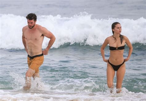 Liam Hemsworth Shows Off His Ripped Beach Bod During A Morning Swim