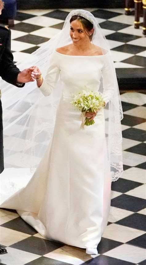 meghan markle s wedding dress compared to kate s the queen s diana s