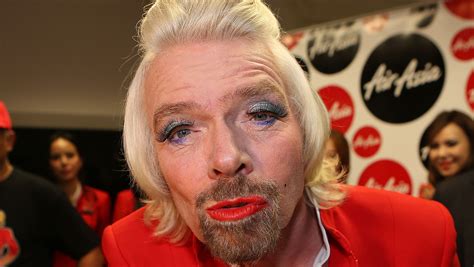 Virgin S Richard Branson Loses Bet Serves Fliers In Drag