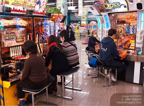 photo  people playing  arcade  odaiba tokyo stock image mxi