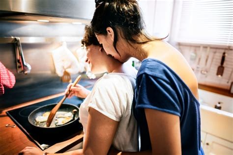 Premium Photo Lesbian Couple Cooking In The Kitchen Together
