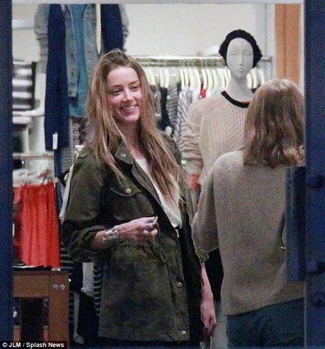 amber heard and johnny depp s daughter lily rose bond in la daily mail online