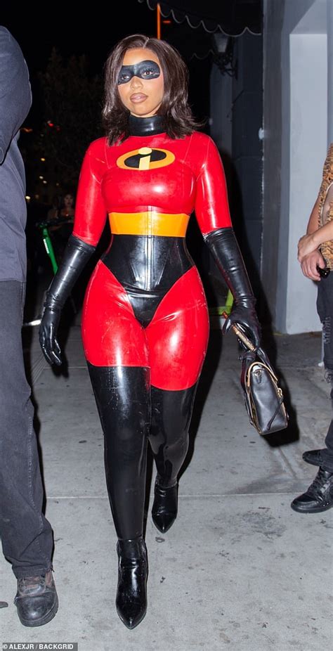 diddy transforms into batman as he arrives at halloween party in a