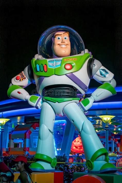 night time shot  buzz lightyear editorial stock photo image  decoration attraction
