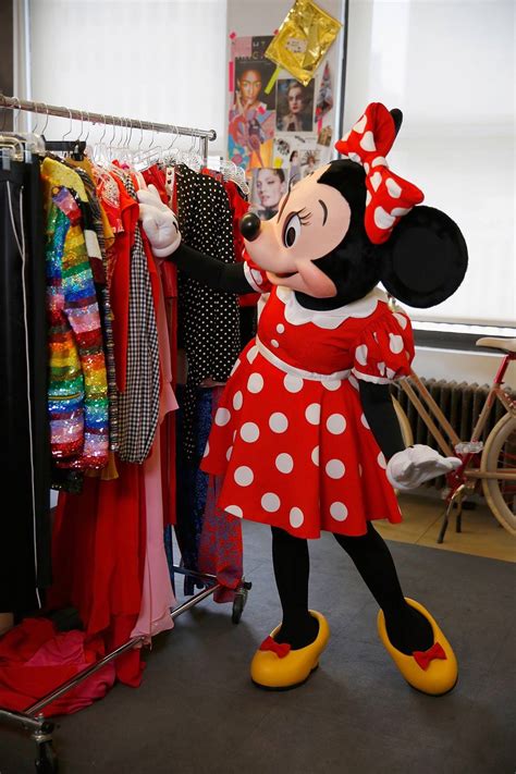 minnie checking the very many styles of dresses that she d