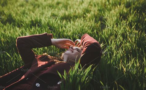Girl Lying In The Grass High Quality People Images ~ Creative Market