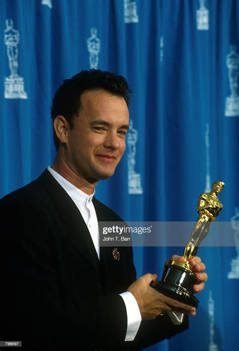 actor tom hanks receives his oscar at the academy awards in los news