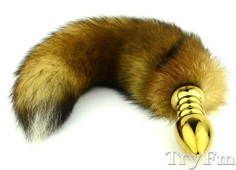 natural red fox tail with stainless steel gold spiral plug
