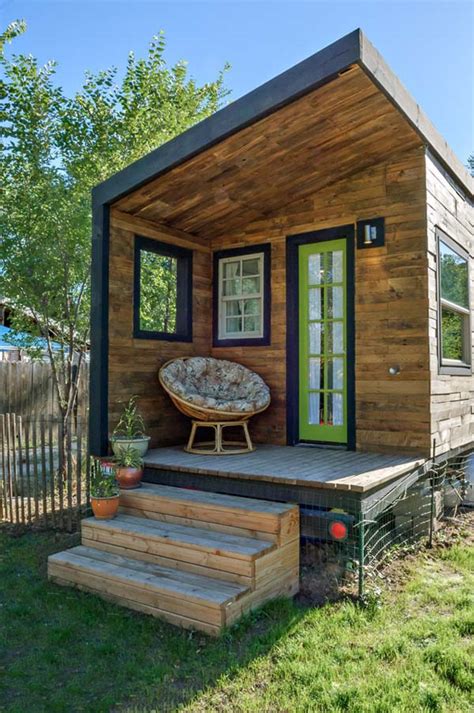 woman bypasses mortgage payments builds  tiny house