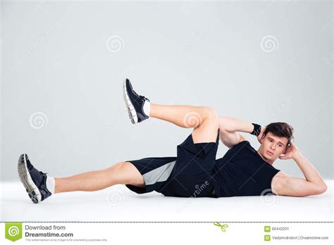 athletic man doing abdominal exercises stock image image of building