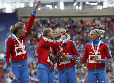 Russian Athlete Denies Podium Kiss Was Meant To Back Gay Rights