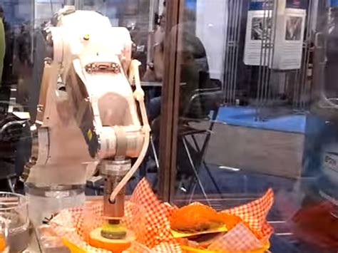 fast food robot serves  burgers  hour