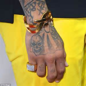 Chris Brown Gets More Tattoos On His Neck As He Snoozes While Getting