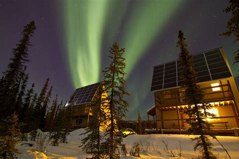 northern lights shine   cabins     aurora borealis dream vacation