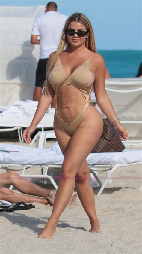 anastasia kvitko in a gold cutout swimsuit celebrity bikini style