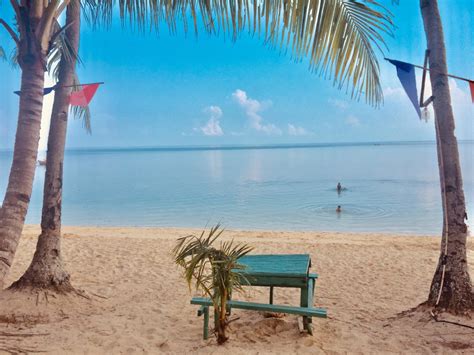 hidden beach resort aloguinsans famous budget beach getaway