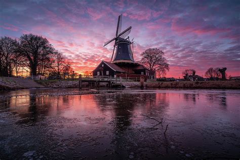 Beautiful Dutch Windmill In Holland During Sunset