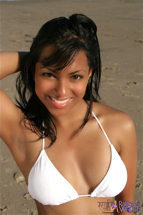 sexy indian teen on the beach in a bikini takes off her top porn