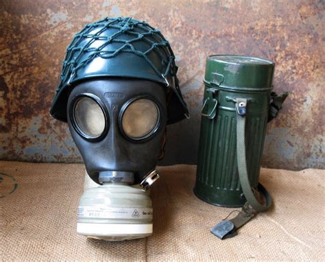 west german gas mask and helmet with storage canister collectors weekly