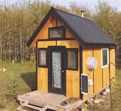 family built   grid tiny cabin    days  grid world