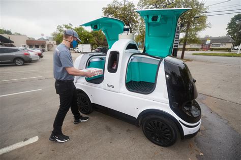 upbeat news dominos tests   driving robots  deliver pizza