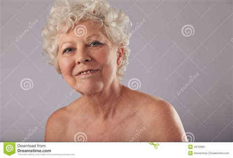Confident Old Woman With Smile On Her Face Stock Image