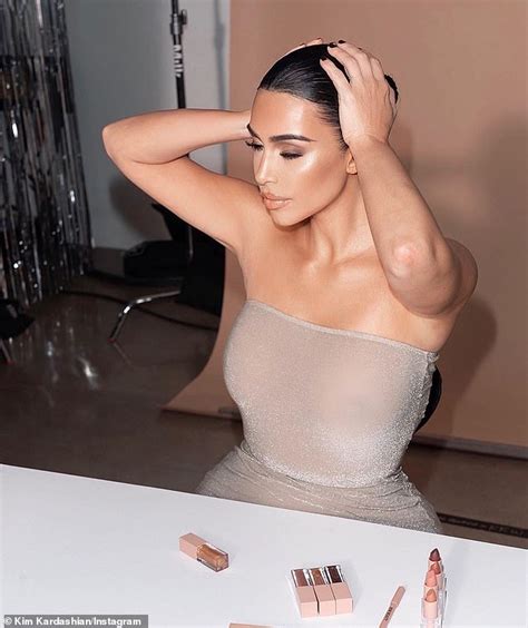 Kim Kardashian Flaunts Her Hourglass Curves In Cream Dress