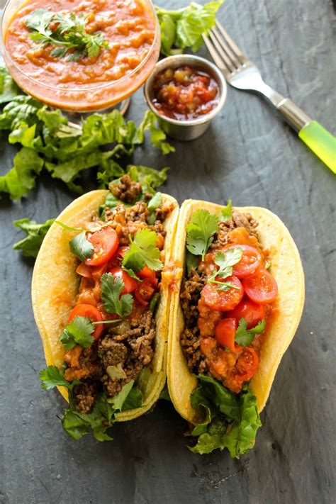 ground beef tacos  loaded refried bean sauce layers  happiness