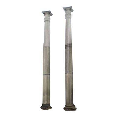 tall limestone columns  doric capitals  pair chairish