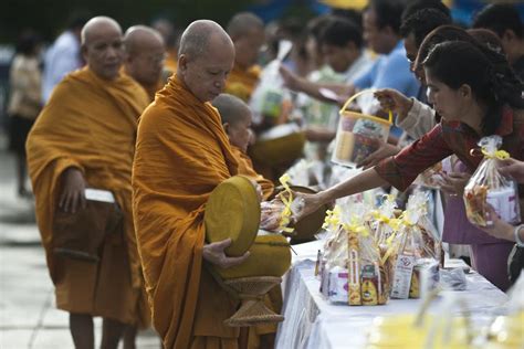 buddhist monks  reversed roles  thailand