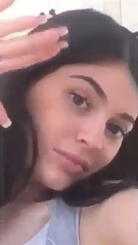 kylie jenner shows top of pregnancy bump and enormous cleavage in bare faced snapchat mirror