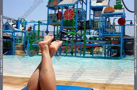 Bare Feet Of A Woman Relaxing In A Water Park Fashion Commercial