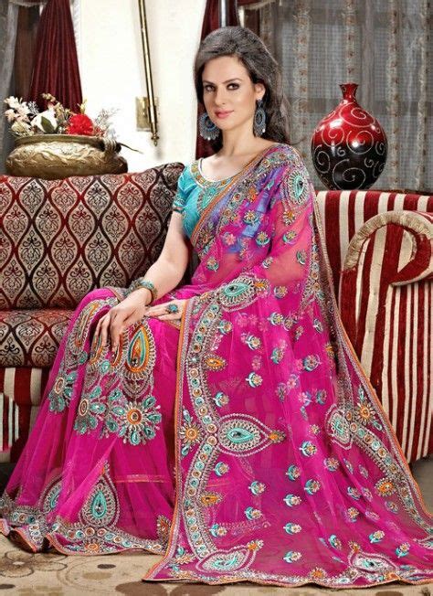 Delightful Magenta And Sky Blue Embroidered Saree Net