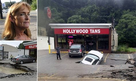 sinkhole swallows up car just seconds after female driver