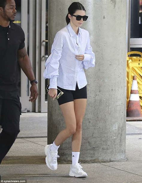 kendall jenner accentuates her figure in skintight cycling shorts