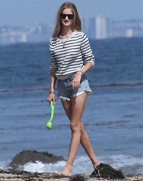 Rosie Huntington Whiteley Shows Off Her Long Toned Legs Again As She