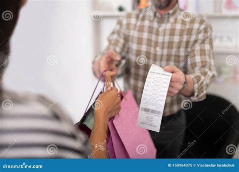 close    seller providing  client  shopping packages stock image image
