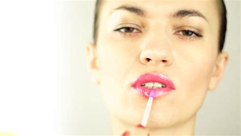 Woman Applying Pink Lipstick Isolated Hd Stock Footage Clip