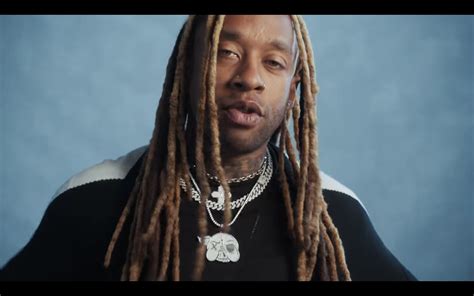 see ty dolla ign j cole in reflective purple emoji video rolling