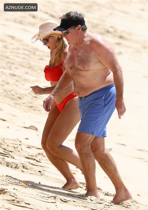 linda holliday and bill belichick enjoy a day at the beach