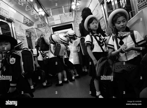 Asia Tokyo Japan Young School Girl In Uniform On Subway Train Stock