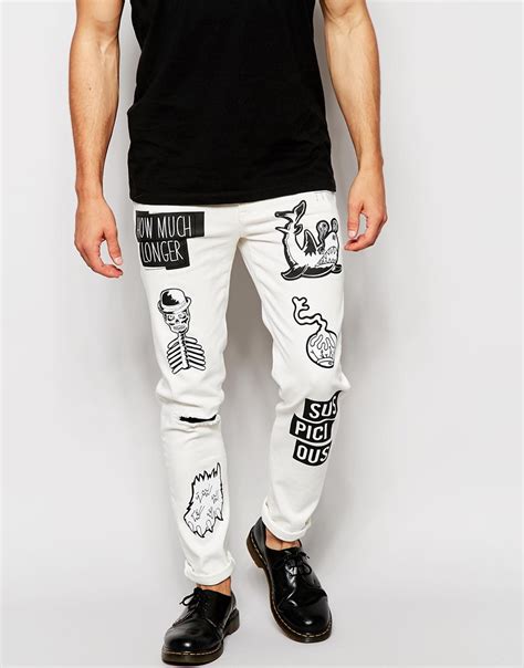 asos skinny jeans with printed badges in black for men lyst