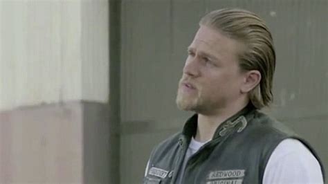 charlie hunnam does christian grey impression at sons of