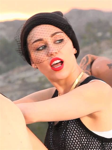 miley cyrus red lips in ‘we can t stop — get her hot new