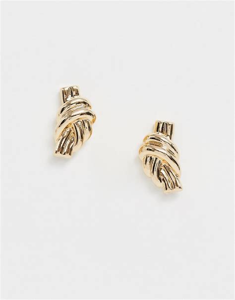 asos earrings  twist knot detail  gold tone  metallic lyst