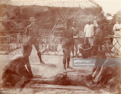 british traveller watching a slave being beaten democratic republic