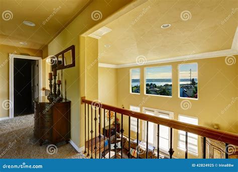 upstairs hallway overlooking living room stock image image  ceiling candles