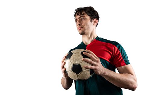 football player holds  ball    ready  play  soccer