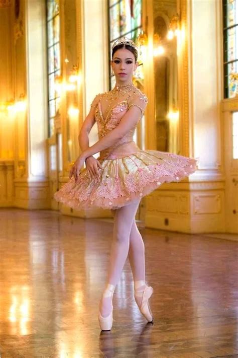 ballerina in pink fancy outfits dance costumes dresses