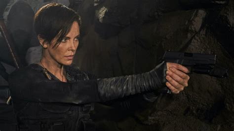 charlize theron is an immortal assassin in first look at